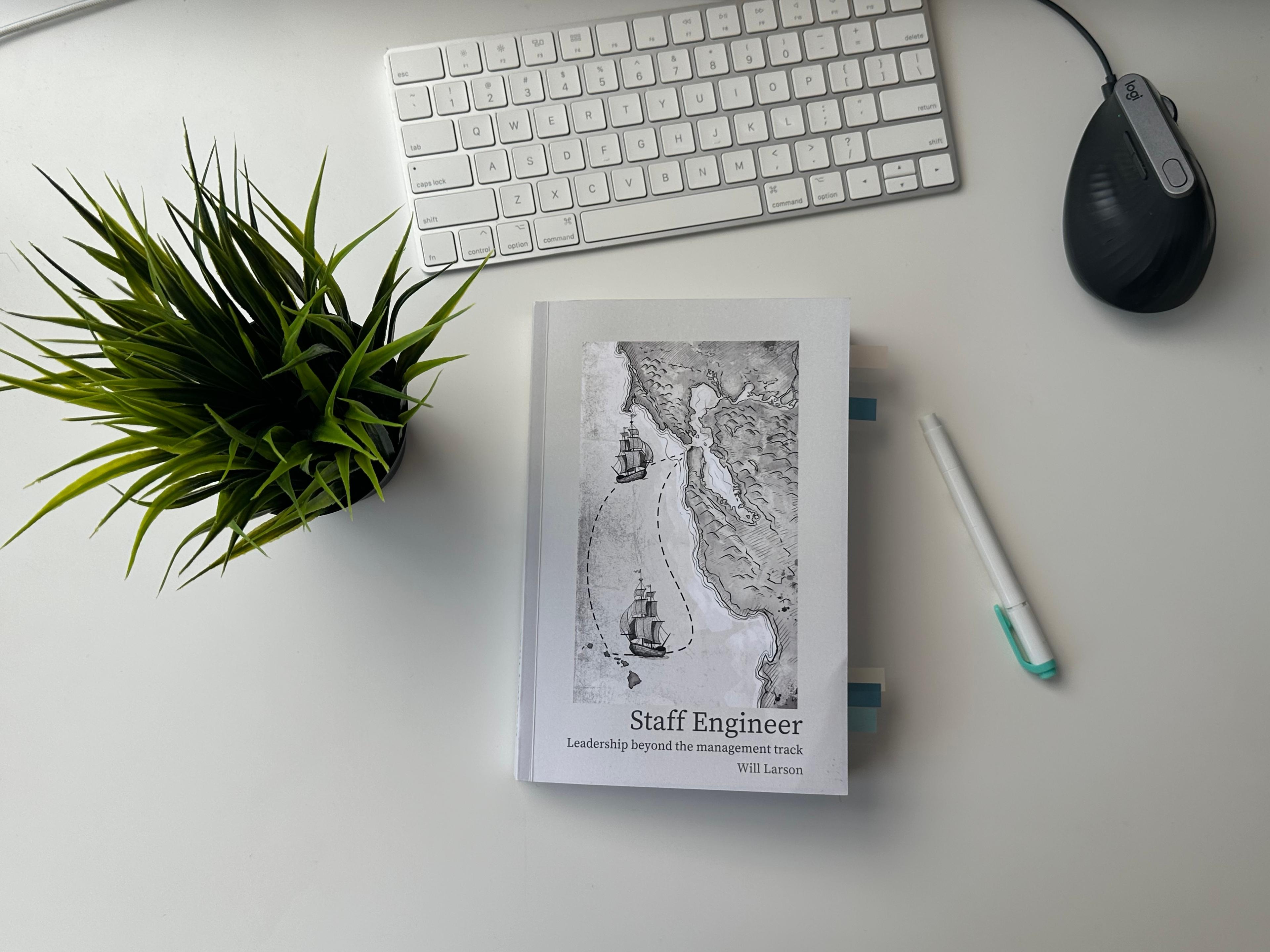 Paperback copy of Staff Engineer by Will Larson on my desk